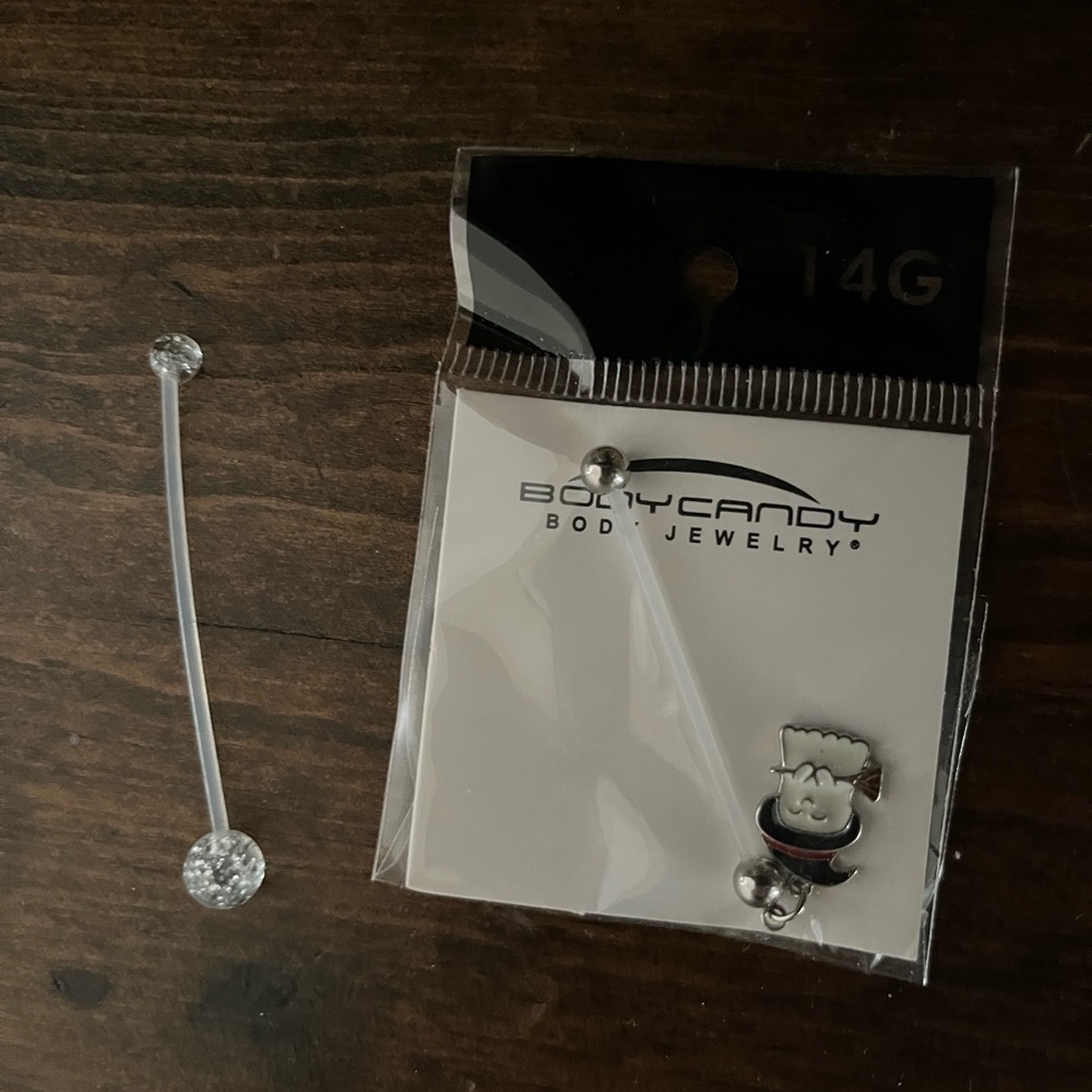 Two BodyCandy Maternity Belly Rings with ghost charm and one plain.